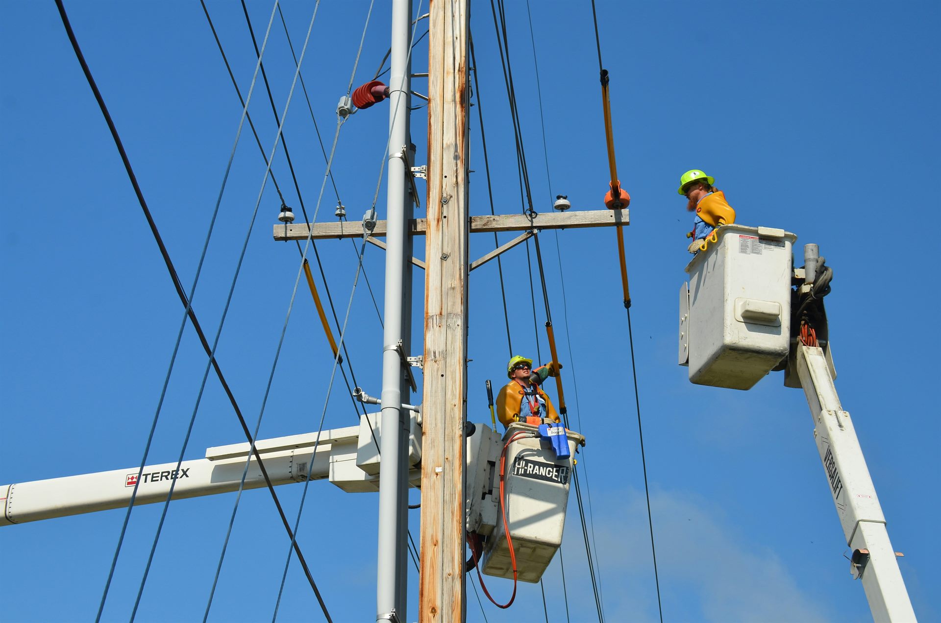 Electrical crew working on power lines